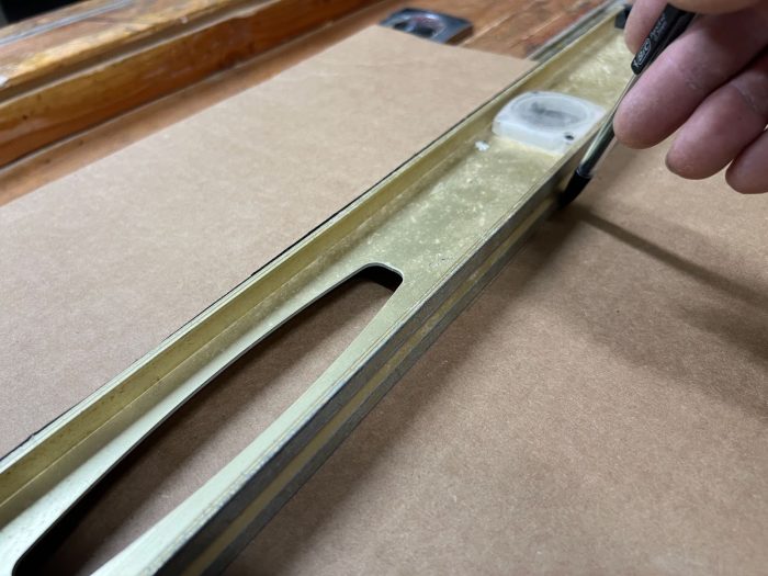 Make a centerline mark on your template piece using a long straight edge .